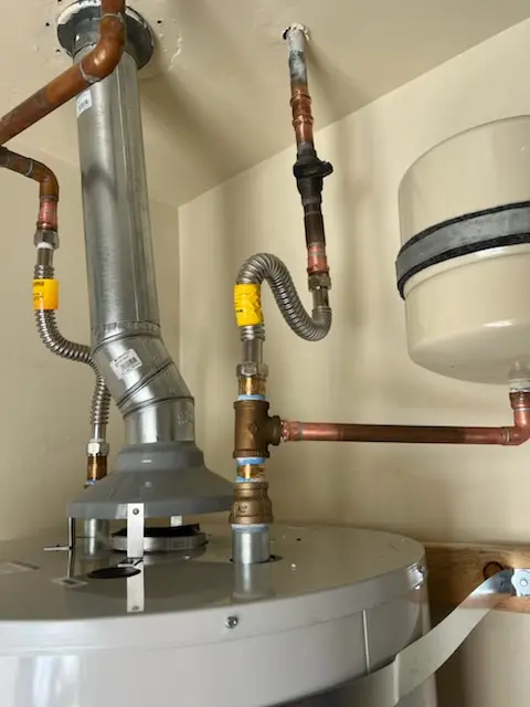 Water heater installation and plumbing repair in Houck Manor